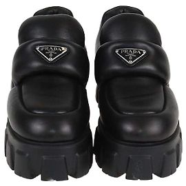 Mocassins Oxford de couro preto acolchoado com plataforma da Prada Preto
