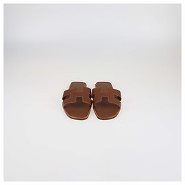 Hermès Hermes Gold Box Leather Oran Flat Sandals Golden