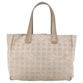 Bolsa de viagem em nylon média da Chanel Bege