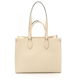 Borsa tote Louis Vuitton OnTheGo MM in pelle Monogram Empreinte Bianco Crudo