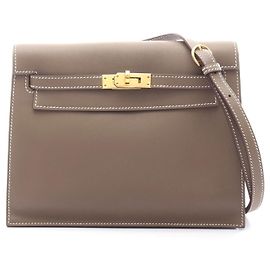 Bolsa Clutch Kelly Dance 2 Hermès em couro marrom Marrom