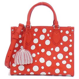Borsa On The Go Monogram Empreinte di Louis Vuitton Rosso