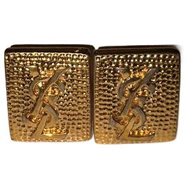 Orecchini Yves Saint Laurent clip martellati oro D'oro