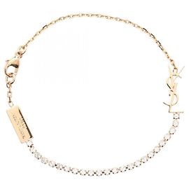 Yves Saint Laurent Bracelet Accessoire Cassandra Charm de Saint Laurent Paris Doré Métallisé