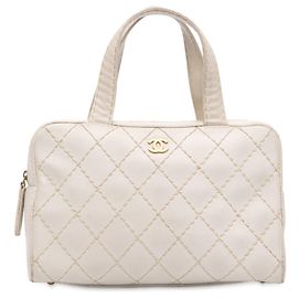Bolsa Chanel em couro de cordeiro branco com costura selvagem CC Branco