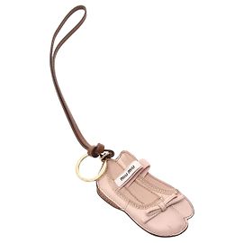 Chaveiro de couro Miu Miu com charme de bala Rosa