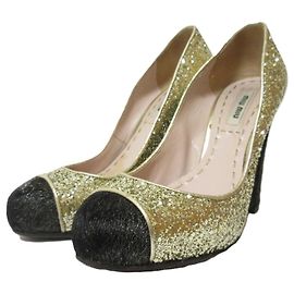 Miu Miu Glitzer-Haarwildleder-Pumps Schwarz Golden