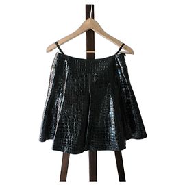 Saia de couro preta Alaïa com padrão de crocodilo, nova com etiqueta, tamanho 36 Preto