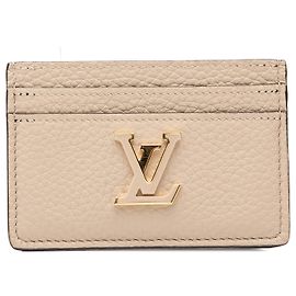 Tarjetero Capucines en Taurillon Marrón Louis Vuitton Castaño Beige