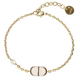 Bracelet Petit CD en résine perlée plaqué or Christian Dior Doré