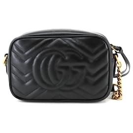 Gucci-Bolsa de ombro mini em couro matelassê GG Marmont da Gucci-Preto