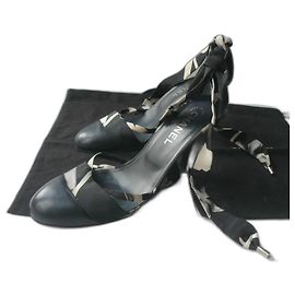 CHANEL Black Leather Camellia Ankle Strap Heels in Good Condition, Size 39.5 IT Black
