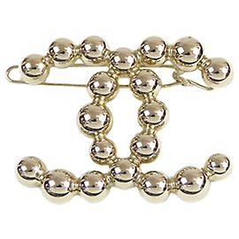 Barrette en perles dorées CC de Chanel Doré Autre