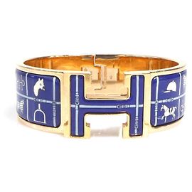 Pulsera Bangle Click-Clack de Hermès Azul Dorado Blanco roto