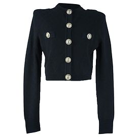 Giacca cropped imbottita nera Balmain con bottoni dorati Nero