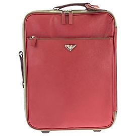 Bolso de viaje de cuero Saffiano con logo triangular Prada Roja