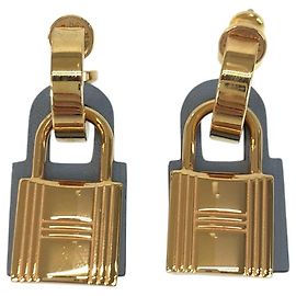 Hermès Orecchini in pelle placcata oro blu Hermes Kelly D'oro Metallico