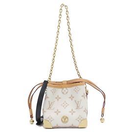 Bolsa Noé Monogram Dune Louis Vuitton Bege Outro