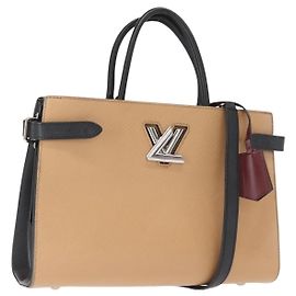 Bolsa Twist Louis Vuitton em couro Epi Bege