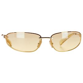 Gafas de sol ovaladas Miu Miu Nocturne en metal dorado Dorado