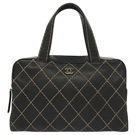 Chanel Surpique Boston Bag Quilted Leather Large Black