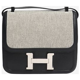 Hermès Constance em couro e lona preta Preto