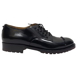 Scarpe Derby in pelle con lacci spazzolati Rockstud di Valentino Garavani Nero
