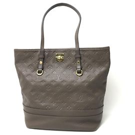 Borsa Tote Citadines PM in Monogram Empreinte Louis Vuitton Marrone