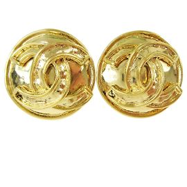 Chanel Vintage Boucles d'oreilles clips rondes CC en métal Doré