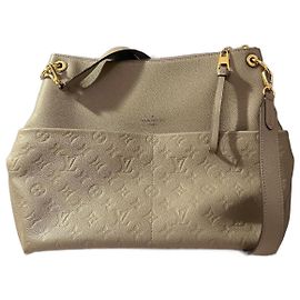 Louis Vuitton Bolsa de couro Maida Hobo Bege