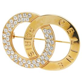 Céline Broche de strass com logo circular Celine Dourado