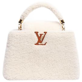 Louis Vuitton Bolsa Capucines em shearling creme Cru