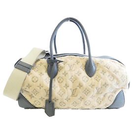 Bolsa Boston em denim Monogram Louis Vuitton Azul