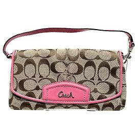 Clutch em couro e lona com assinatura Coach Marrom