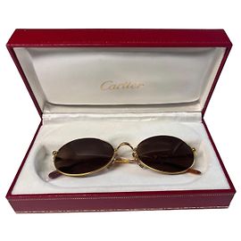 Gafas de sol Cartier de metal dorado Dorado