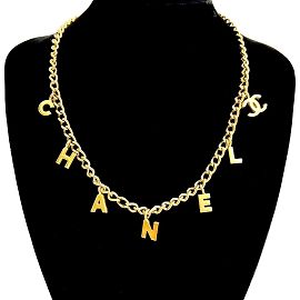 Collier en chaîne plaqué or avec motif logo Coco Mark vintage de Chanel Doré