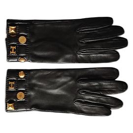HERMÈS GUANTI CON “H” – PATCH E BORCHIE. Nero