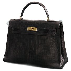 Magnífico saco Kelly 32cm em couro de crocodilo preto da Hermès Preto