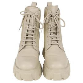 Botas de combate Monolith em couro e nylon bege da Prada Bege