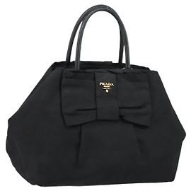 Sac à main PRADA en nylon et cuir noir avec ruban doré Auth 153236 Noir Doré