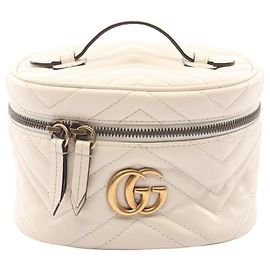 Mochila Mini GG Marmont de Gucci Crudo