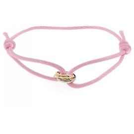 Pulsera Charm Trinity de Cartier Dorado