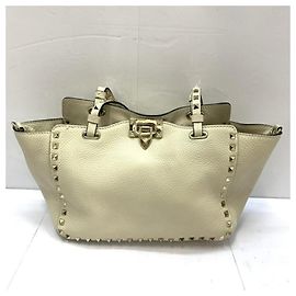 Bolso Tote Rockstud Valentino Garavani Dorado