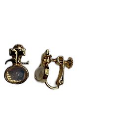 Clip de oreja con logo dorado vintage Courreges Paris Dorado