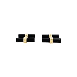 Boucheron Manschettenknöpfe aus Gelbgold und Onyx. Andere