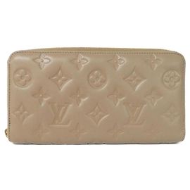 Cartera Zippy Coussin Louis Vuitton Gris pardo