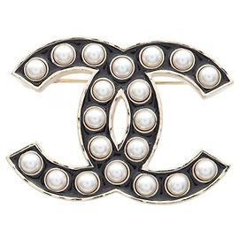 Spilla Coco Mark di Chanel Nero Bianco D'oro