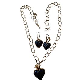 Colar Longo Just Cavalli em Aço com Corações de Ônix Negro Dourado