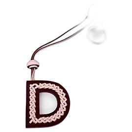 Chaveiro Tod's e charme branco Rosa