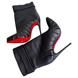 Christian Louboutin Botines Negro Dorado
